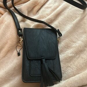 Elegant Black Leather Crossbody Bag with Tassel